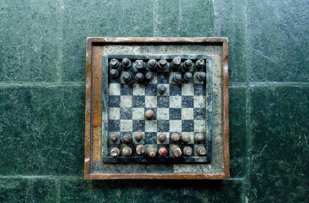 Chessboard on Green Surface